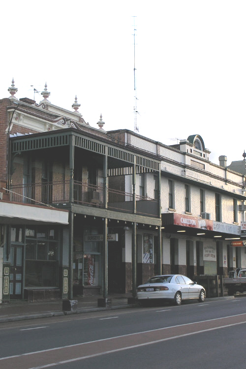 Photo of Collie's main street. Throssell street, showing old Crown Hotel pub with verandahs